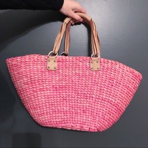 Pink straw tote.